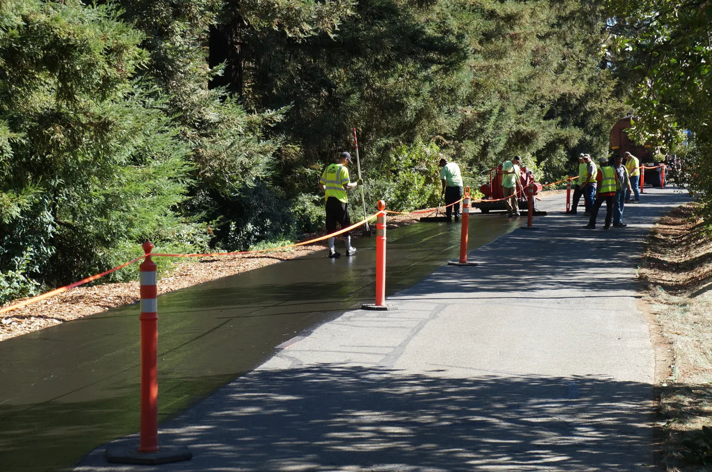 Crew performing sealcoating work at UC Davis